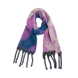 Detail of chunky knit star scarf with thick fringe and purple color-block design