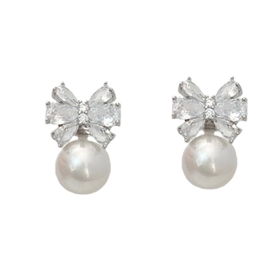 Elegant bow stud earrings with sparkling cubic zirconia and white round pearls