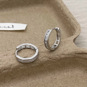S925 silver hoop earrings with channel-set square zircon stones shown at 45-degree angle