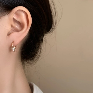 Elegant rose gold star hoop earrings with sparkling crystal stone for women