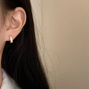 Elegant gold shell hoop earrings for women with minimalist white enamel inlay