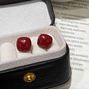 Elegant square red pearl earrings in a black leather gift box with minimalist design