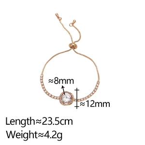 Macro detail of adjustable rose gold bracelet with sparkling zircon halo and slider clasp