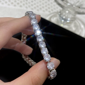 Single row tennis bracelet with sparkling cubic zirconia on a silver metal chain