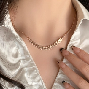 Sparkling zircon wheat pendant necklace in rose gold plating with a refined snake chain