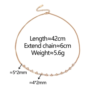 Macro shot of rose gold plated necklace with small cubic zirconia and lobster clasp