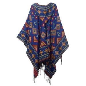 Detail of bohemian hooded poncho with blue geometric knit patterns and black tassels