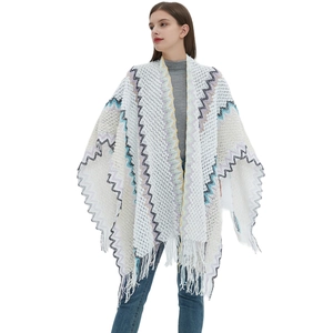 White knitted shawl with colorful zigzag patterns and long tassels for women