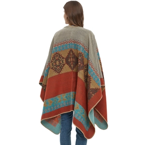 Ethnic knit shawl cloak with geometric patterns and thick tassels in autumn colors