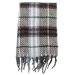 Close-up of thick plaid scarf featuring fringe edges and a blue and grey checkered pattern