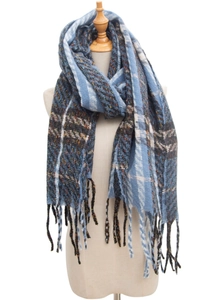 Detailed close-up of blue plaid scarf texture with soft fringe and knit pattern