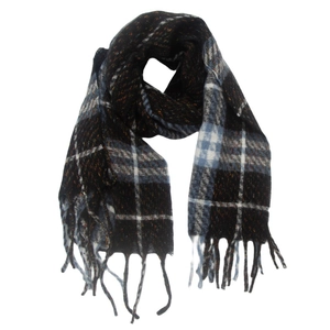 Close-up of the thick plaid scarf fabric with navy blue patterns and fringe edges