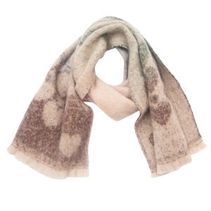 Detail of faux mohair scarf with dark brown heart pattern and short fringe edges