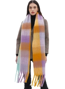 Detail of colorful plaid scarf with long tassels featuring purple and orange chunky knit yarn