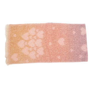 Close-up of gradient heart pattern knit scarf with fringe details in soft pastel colors