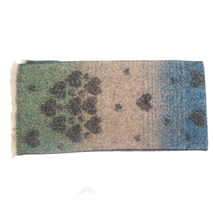 Detail of gradient forest green and beige scarf with heart pattern and fringe trim
