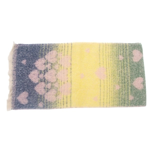 Detail of soft gradient scarf with pink heart patterns and elegant fringe trim edges