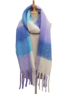 Close-up of thick checkered knit scarf with long tassels in lilac, blue and cream