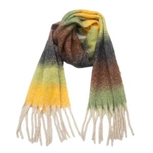 Close-up of knit scarf showing yellow and green gradient boucle yarn and thick tassels