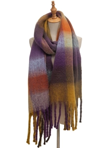 Detail of multi-color plaid scarf with thick tassels and soft brushed texture