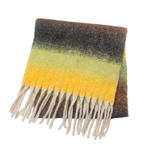Detail of chunky knit scarf with multi-color gradient stripes and cream tassel fringe