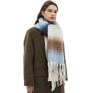 Winter chunky boucle yarn scarf with multi-color gradient and thick white tassels