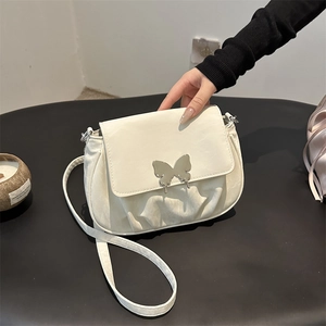 Elegant off-white pleated shoulder bag for women featuring a metallic butterfly clasp detail