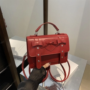 Red vintage preppy backpack with heart embossing and bows for women students