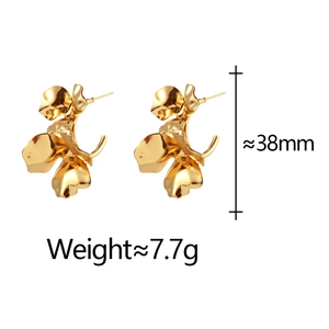 Detail view of golden flower earrings showing 38mm height and 7.7g weight dimensions