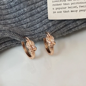 Sparkling rose gold knot earrings with micro-paved cubic zirconia for women