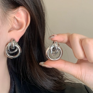 Modern triple-intertwined silver hoops minimalist geometric earrings for women
