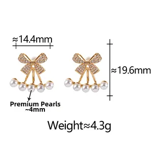 Detail view of pearl bow earrings with precise size measurements in millimeters