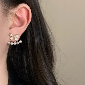French style bow earrings with sparkling micro diamonds and five pearl accents