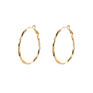 Twisted gold hoop earrings with textured metal finish shown in a balanced flat lay view