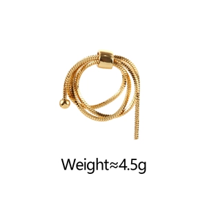 Detail of adjustable gold-plated layered snake chain ring with small bead accent