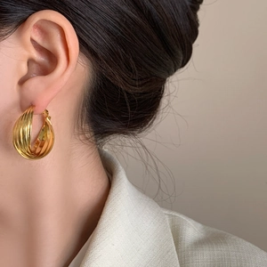 Minimalist gold-layered hoop earrings with a polished mirror finish for women