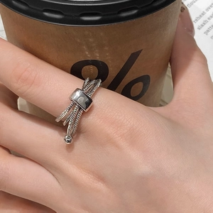 Adjustable multi-layer silver twisted chain ring with polished rectangular slide on finger