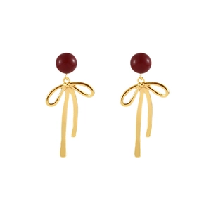 Exquisite gold-plated bow earrings with red cinnabar beads in a festive vintage style