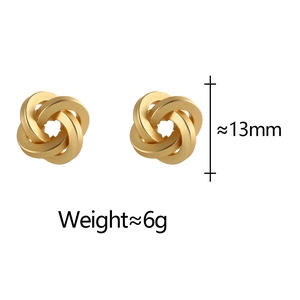 Detail shot of matte gold twisted knot earrings with dimensions 13mm and 6g weight