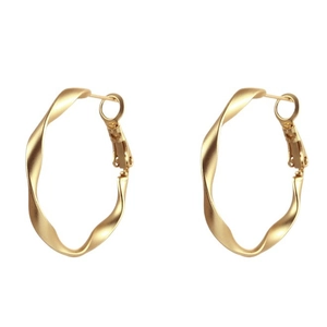 Minimalist twisted gold geometric hoop earrings with matte finish on white background
