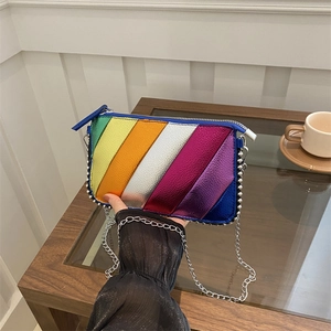 Rainbow striped crossbody bag with silver bead trim and metallic chain strap