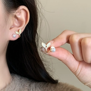 Elegant fishtail cat-eye stone pearl earrings for women in gold metal finish