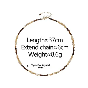 Detail showing 37+6cm length and 8.6g weight of tiger eye stone and shell beaded necklace