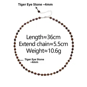 Close-up of 4mm tiger eye stone beads necklace with silver lobster clasp and extension chain