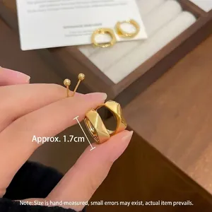 Minimalist gold-plated geometric hoop earrings with polished faceted design for women