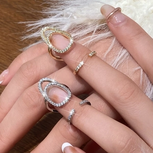 Luxurious gold and silver micro-set zircon nail rings with hollow shimmering crystal sets