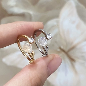 Adjustable camellia flower open ring in gold and silver plating with cubic zirconia detail