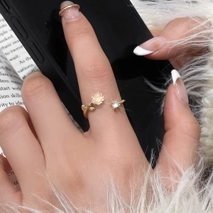 Adjustable gold flower ring with camellia design and sparkling zircon stone for women