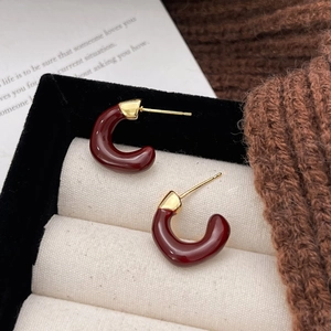 Retro C-shaped burgundy enamel earrings with gold plating on black velvet gift box