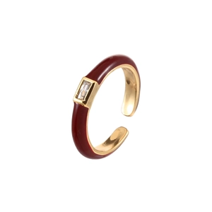 Adjustable gold ring with deep red enamel and a rectangular zircon gemstone center